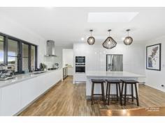 206 Angela Rd Rockyview QLD 4701 $938,000 This quality built home with Inground Pool, Sandstone Surrounds, Powered 10m x 9m shed plus 13 m x 4m Lean to for a Caravan or Boat and another 10m x 4m lean to at the front of the shed, this property has beautiful rural and city views, it’s a must Inspect….. – Modern Kitchen with 40cm Stone tops, Premium Cooking, Chef’s Pantry and Walk In pantry – Main Bedroom with a beautiful Walk In Robe and Ensuite – Open Plan Lounge/ Dining and Kitchen – 2nd Lounge or Media Room – Fully Air-Conditioned – High Ceilings throughout – Loads of Storage throughout Home – Inground Pool with Waterfall and Sandstone Pavers – Fully Fenced Property – Automatic Water Sprinkler System – 2nd Bathroom with bath and separate shower, floor to ceiling tiles, plus powder room – Shed with 15 Amp Power, High Doors, Room for Caravan and a Boat – Quality Timber look flooring throughout
