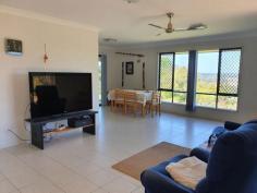 10 Rosalie Dr Yarraman QLD 4614 $450,000 This 3 bedroom brick home is set on 4041m2 on a corner position . The house has an ensuite, built-ins, ceiling fans , reverse cycle air con. , security screens, tinted windows , insulation , 5w solar power & town & tank water. The modern kitchen has a an electric oven, cook top, rangehood & dishwasher, two way , giving entry to the dining room & lounge room. While you are sitting on the patio having a cuppa, you get to relax, with the great views over looking the township of Yarraman. This property has well established terraced gardens, Plus a 3 bay all steel garage (approx. 20mt x 9mt ) with an entertainment area, toilet, shower , pot belly wood heater, stove , & enough room to store a large caravan in the carport,