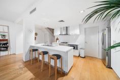 2/27 Noalimba Cres Bateman WA 6150 Located in the prestigious Noalimba Estate, this low-maintenance lock and leave home is within walking distance to Bull Creek Train Station and local parklands, along with the added benefit of being within the sought-after Rossmoyne Senior High School zone. Neat and unassuming from the outside, this property will impress from the moment you enter. The open plan meals, living and kitchen area features easy-care timber flooring and is flooded with natural light. The modern kitchen offers quality stainless steel Blanco appliances (including a gas cooktop), a generous island bench and an abundance of storage, with stone benchtops throughout. This living area conveniently extends in to the tranquil, north-facing rear outdoor entertaining space, perfect for summer barbeques or as secure area for kids and pets to play! This ground-floor also features a separate laundry, powder room, and a generously-proportioned Home Office/lounge/fourth bedroom option. Upstairs, there are three good-sized bedrooms with the large master bedroom comprising a walk-in robe, en suite with full-height tiling and private balcony. The minor bedrooms each contain mirrored built-in robes, full window treatments, and ceiling fans, and one offers a study nook with built-in desk, floating shelf, and overhead cupboards. Also on this level, the main family bathroom offers a separate bath and W/C. Additional features of this fabulous home include high ceilings, ducted reverse-cycle air conditioning, understair storage, a secure double lock-up garage with adjoining workshop/storeroom, and automatic reticulation with near-new controller. Surrounded by high-end properties, this property is centrally-located in close proximity to Fiona Stanley Hospital, Murdoch University, Westfield Booragoon, parks, primary schools, and a host of public transport routes.
