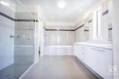 21 Thorneycroft Avenue Wodonga VIC 3690 $725,000 to $750,000 With a commanding and stately presence, this 2011 built home is sure to grab your attention. Situated on a spacious 855m2 block, offering four bedrooms, two and a half bathrooms and four living areas, this impressive home has been elegantly designed to accommodate the needs of an expanding family. As you enter the home through the double wooden doors, the impressive foyer greets you with an elegant staircase and stunning polished tiles. You will find the formal lounge room to your left and the home office or study to your right, both bathed in natural light, overlooking the quiet street front. The grand staircase leads to a central living space upstairs, with all four bedrooms and the main family bathroom adjoining. Space is luxury, and this master suite will not disappoint. With double glass doors opening onto the private balcony, a huge walk-through robe and a generous, luxury ensuite, this master is the pinnacle of comfort. This kitchen is a chef's dream, with ample storage options, a huge walk-in pantry, stainless steel appliances, including a 900mm wide oven, and stunning stone benchtops. The spacious open plan kitchen, living, dining flow out through glass doors to the undercover alfresco area. With space for all the family, the generous rumpus room is versatile and would make the perfect kids play area or home theatre. The backyard is very low maintenance with plenty of scope for a future pool or shed (STCA). The double lock-up garage can be accessed via the internal door through the laundry or backyard through the single rear door. With 321m2 of living space, what more could you ask for?