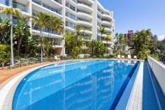 611/54 West Esplanade Manly NSW 2095 $3,500,000 Holding pride of place on the harbourfront directly opposite Manly Wharf, this exclusive executive apartment is located within the ‘Grande Esplanade’ security building with facilities worthy of a 5-star resort. Sheltered at the rear of the sixth floor with a sun-drenched northerly aspect, the residence is distinguished by its overly spacious layout, superb appointments and extensive sunlit balcony with views to the ocean. The perfect trophy retreat for executives, downsizers or weekenders, it is literally metres from cosmopolitan eateries and a short stroll down The Corso to Manly Beach. • Unequivocally one of the finest buildings and locations in Manly • Extensive light filled living space with large dining area • Easy flow to an extra-wide balcony awash with northerly sunlight • Views over the pool and parkland to the village and the ocean • Granite and gas kitchen with dishwasher and scope to upgrade • Ample bedrooms with built-ins, main with ensuite open to balcony • Stylish bathrooms with marble vanity-tops and flooring plus spa • Tropical resort-like pool with sunlit patio plus lawn with barbecue • Fully-equipped indoor/outdoor gym, sauna and change rooms • Full brick, engineered oak floors, ducted air con, video intercom • Grand entrance lobby with seating, full time building manager • Move straight in or revitalise and flaunt your designer flair • Secure covered car space, covers a sizable 144sqm on title