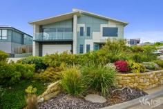 23 Trevassa Crescent TRANMERE TAS 7018 Class and Quality with Spectacular Water Views Showcasing a cutting edge design that offers an uncompromising level of quality over two levels, this superbly appointed home offers the best of everything in an exclusive Tranmere location. With expansive views across the River Derwent to the city and Mt Wellington/kunanyi as a backdrop, this home offers quality living in complete comfort and style. The versatile floor plan offers 3 to 4 bedrooms, 2 bathrooms plus a powder room and multiple indoor and outdoor living options. The upper level of the home features a fabulous open plan kitchen, dining and living space. The kitchen is modern and elegant with quality appliances, sleek storage and an impressive butlers pantry. There is a balcony located directly out from the living area, making the most of the stunning views. An amazing undercover entertaining area is also accessed from this living area providing a fabulous space for family and friends. On the entry level there is a large double garage with remote controlled door and internal access, a large workshop area as well as a huge amount of storage. Externally there is space for a boat or caravan as well as further off-street parking for several vehicles. The home is fully fenced with amazing and stunning gardens surrounding the property. Desirably located close to Shoreline Shopping Plaza, schools, beaches and recreational facilities, this is an excellent opportunity to acquire a relaxed, easy and comfortable lifestyle within 15 minutes of Hobart’s CBD and Salamanca. For further information, please contact the listing agents Graeme and Rose on their mobile phones, email or Facebook. . Functional and versatile floor plan with quality fit out . Panoramic views of the water, city and mountain . Spacious sun-filled open plan living . Striking kitchen, quality appliances, butlers pantry . Fantastic undercover entertaining area . Luxurious main bedroom with ensuite and WIR . 7.5 kilowatt solar system – 20 panels . Solar hot water – 400 litres of storage . Double glazed windows and doors . LED lighting throughout . Huge workshop area, fantastic large storage area . Double garage with remote door and internal access . Room for boat or caravan plus further off-street parking . Beautiful landscaped gardens surround the property . Close to Shoreline Plaza, beaches, schools and recreational facilities . 15 minutes to Hobart’s CBD and Salamanca
