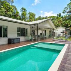 22 Coconut Grove Kuranda, QLD 4881 HOUSE FOR SALE IN KURANDA NEAR NEW - PRIVATE - TRANQUIL 4 Beds 2 Baths 3 Cars ABSOLUTE PRIVACY HERE All the mod cons in a tropical oasis. This designer home was purpose-built for the whole family to enjoy. Two living areas, large bedrooms, amazing kitchen area that looks out over the pool and entertainment area, loads of storage space for all the toys, and all this sits on a gorgeous 3759m2 block - you even have a cyclone shelter! Or wine cellar- your choice. Built for our enviable lifestyle and environment, the home is built of low-maintenance materials that need little upkeep - perfect. Ideally positioned at the end of the street in one of Kuranda's prestigious locations is another bonus. Airconditioned & Crimsafe screens Most areas of the home open to outside Stunning timber floors throughout Fantastic outdoor entertaining is well catered for here Magna pool with a stunning rainforest backdrop Town water House & carport are both steel framed This is a stunning low-maintenance home with nothing needed except to move in and enjoy! Ray White Smithfield Call Sonia Poole on 0407 028 388 for further information or to arrange an inspection. Land: 3,759m² / 0.93 acres Parking: 3 garage spaces Bedrooms: 4 Bathrooms: 2