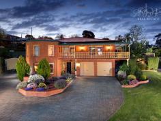 8 Beard Cres Wodonga VIC 3690 $1,150,000 Highly sought after but seldom found, our extensive Federation style home sprawls over two grand levels and offers over 43 squares of premium living all set perfectly on a substantial 1721m2 allotment. Positioned with lovely high elevation, relax on the north easterly facing balcony and enjoy the uninterrupted views over Willow Rise that extend as far as Albury city from daylight to dusk. You will be hard pressed to find a combination offering six bedrooms, three bathrooms, three living areas, five car garage PLUS extensive room for your oversized caravan and incredibly….a yacht! Ground Level: - A fully serviced apartment with kitchenette, en-suite, lounge and bedroom, - Extensive garage and separate entry for secondary garage / boat storage, - Ample wine storage for the astute collector, - The rear of the property is largely excavated for storage and the sheer size and expanse will impress. Upper Level: - Master suite with stunning en-suite, walk in robe and direct access to the balcony, - A further four queen sized bedrooms will accommodate the largest of families, - Full family bathroom with dual basins and stunning claw foot bathtub, - The timelessly designed kitchen is the heart of the home and offers double oven, electric cooktop, dishwasher, walk in pantry and incredible bench space that is truly a rare find. - Flowing seamlessly together, the open plan kitchen, family and dining area encapsulates the views and the atmosphere and banter of a bustling family is going to be most welcome, - The lounge room to the front of the home is oversized, measuring a whopping 8.8 x 7.2 meters. Wrapped by the balcony, the aspect is simply delightful with leafy hills and city lights on show, painting a picture that changes with the seasons, - The laundry is generous, with a store room attached creating a perfect utility area. Balcony and Grounds: - No expense has been spared in the construction of the balcony. Featuring intricate floor tiles, decorative cast aluminum balustrade and fully protected with iron roofing, there is no limits to the use of this area. - A feature swim spa / plunge pool is fitted with a heat pump and solar heating making winters most welcoming. Enjoy a winters night whilst star gazing with a glass of bubbles overlooking the sparkling city lights, - The entertaining area is complete with fan, retractable awning to extend the roofline and multiple water points to care and maintain your plants, - There are three driveways in total; the first to the main garage, second to the caravan / boat bays and a third separate drive wraps to the rear yard that is certainly generous in size. Utilities: - Evaporative cooling, 6 star rated ducted gas heating unit and cosy wood fire upstairs with a split system unit downstairs, - Two instantaneous hot water units (including hot and cold water outside the 5th garage) - 3.04kw solar system with 66c per kw until 2024.