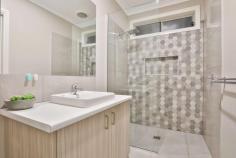 3 Retreat Court Irymple VIC 3498 $589,000 - $645,000 Positioned on a grand half acre allotment and surrounded by other quality homes is this near new property. An immaculate four bedroom home built by well renowned builders UBS in Dec 2018; finished off with stylish fixtures & fittings and highlighted by a truly large kitchen. Neutral tones are offered throughout, you've got a modern façade and popular vinyl planks through your entry way to the living zone. With three phase power connected this home is also ideal for the tradie. In the heart of the home sits an oversized kitchen with walk in pantry, standalone island bench, double sink to the side below window and a large 900mm gas cook top & electric oven. This space views your living zone and flows out to outdoor entertaining whilst viewing a neat landscaped yard with automatic irrigation. Creature comforts of ducted reverse cycle heating/cooling, town water, town sewerage & natural gas are all included. Your yard is cleverly designed to keep the kids & pets away from your monster 17.5x7x3m shed with a dedicated point of access and space for an array of vehicles. Part of this shed in enclosed, lined & currently set up as a salon, with hot & cold water connected, just use your imagination for what could be set up here! All of your in town conveniences are offered within an out of town lifestyle, yet just 10 minutes to Mildura's Fifteenth Shopping Precinct!