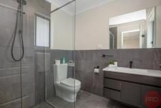 122 Washery Road North Rothbury NSW 2335 $599,000 to $660,000 Nestled on 960 sqm in a peaceful street, looking across the road to bushland with nature's wildlife at your front door. Only 3 years old this lovely well presented home is ideal for the first home buyer or anyone looking for low maintenance property, as well in a great location being a short distance from the New Huntlee Shopping village, Hunter Expressway and much more. Seated on a level block this home offers easy access with no steps, and lots of parking for a caravan. The home's visual appeal continues inside, with a simple, modern interior that ensures the rooms feel bright and spacious. This beautiful property would also be a great family home having a spacious modern living/dining, lounge with split system A/C and ceiling fans throughout. Sliding doors open to a alfresco area great for entertaining also having a well sized yard for the kids or pets to play in which you can watch from the lounge room. The modern kitchen, has been fitted with a dishwasher, gourmet 5 burner gas stove and finished off with beautiful glossy black stone benchtops sure to capture your eye. All four bedrooms are well set out around this gorgeous home with the Master having its own ensuite and split system A/C also being at its own end of the home, ideal for a shift worker/light sleeper, all other rooms having there own walk in robe. Also has a double garage which is well sized.