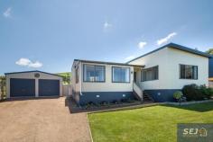 87 Victoria St Toora VIC 3962 $560,000 Enjoying a quiet location at the end of a no through road, elevated to look out over the surrounding farmland to the waters of Corner Inlet and mountains of Wilsons Prom, this immaculately presented residence is a delight to inspect. Set on approx. 611m2 corner block with a double LU garage with front and side access, plus parking, and a separate studio or home office. Enclosed front sunroom with Prom views. Comfortable living room with magnificent solid timber flooring and the convenience of a RC/AC. Stunning kitchen with gleaming cabinetry, 900mm dual fuel stove, stone look bench tops and breakfast bar. Sundrenched rear family / dining room with northerly aspect and views to distant hills. 3 fitted bedrooms, 2 ultra modern bathrooms, one with laundry facilities. Everything has been thought of - 5kW solar power system, fully fenced secure rear garden with paved entertaining patio, raised veggie beds, low cost instant gas hot water. NBN high speed internet. Will appeal to a fastidious buyer - just a minutes walk to the Rail Trail, 2km from boat launching and a stroll to the center of town.