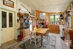 111 Buckland Gap Road Beechworth VIC 3747 $650,000-$680,000 Overlooking Beechworth township "Bella Vista" is a classic example of colonial Australian architecture that has stood the test of time for the last 140 years. The entrance to the home, along the path and through the garden, guides you to the hall with the adjoining four traditional "12 foot x 12 foot" rooms. These four rooms, with "11 foot" ceilings, comprise three bedrooms and the formal lounge. The lounge features an open fireplace and split system heating and cooling unit. At the rear of the home sits the large kitchen and meals area. Here you will find an efficient wood heater in the original fireplace plus a freestanding oven with gas hotplates. A central bathroom, with a separate toilet, a laundry and storage area, are also found at the rear. The depth of colour and variety of flora on the property is a credit to the current owners. Here you can immerse yourself in the bird attracting garden and work on your green thumbs. Despite having town water, the soft lawns and the garden are fed by a perpetual well meaning you can rest easy knowing your town water bills are at a minimum. With verandas on three sides, you have options where you can enjoy your refreshments whilst taking in views of the garden and surrounding countryside. The main body of the home has been reroofed and has been electrically rewired. The 10m x 6.1m shed and workshop area will keep your vehicles and tools out of the weather. There are many options if you wish to construct a larger shed on the land (STCA). The property has the ability to be sectioned into different zones providing plenty of space and making it easy to care for your animals whilst ensuring they don't eat your plants!