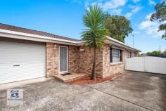 2/29 Alpha Rd Woy Woy NSW 2256 Huge rear courtyard - approx 300m2 - blank canvas! * Spacious master bedroom with built-in robe * Lounge with air conditioning * Separate dining room * Neat, functional kitchen with dishwasher * Original bathroom with separate toilet * Lock-up garage * Second toilet in rear of garage * Full size laundry Fantastic bones ready for updating! Ideally located in quiet tree-lined street. Handy to public transport, Peninsula Leisure Centre, waterfront reserve.