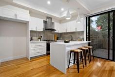 2/251 Elgar Road Surrey Hills VIC 3127 Set back peacefully at the rear and a close walk to Wattle park, this contemporary home delivers a superb combination of low maintenance luxe living. Designed with a stylish interior with chic modern spaces offering a separate lounge room which can be turned into a 4th bedroom with ensuite. Open plan living and dining with gourmet stone kitchen, stainless steel appliances , floor board through out and extending out to a private treelined deck perfect for entertaining or relaxing. Zoned upstairs are three bedrooms, master with ensuite and luxurious bathroom with freestanding bath and tiles to ceiling. Appointed with heating, cooling, security alarm, downstairs powder room, laundry and remote garage with internal access. Ideally positioned near bus services on Elgar Road, zoned for Roberts McCubbin Primary and Box Hill High School, with seamless access to Box Hill Central, the Eastern Freeway/Eastlink, Aqualink Box Hill, Box Hill TAFE and Hospital, Kingswood College, Deakin University, city-bound trams, Surrey Hills Train Station.