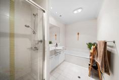 2/27 Noalimba Cres Bateman WA 6150 Located in the prestigious Noalimba Estate, this low-maintenance lock and leave home is within walking distance to Bull Creek Train Station and local parklands, along with the added benefit of being within the sought-after Rossmoyne Senior High School zone. Neat and unassuming from the outside, this property will impress from the moment you enter. The open plan meals, living and kitchen area features easy-care timber flooring and is flooded with natural light. The modern kitchen offers quality stainless steel Blanco appliances (including a gas cooktop), a generous island bench and an abundance of storage, with stone benchtops throughout. This living area conveniently extends in to the tranquil, north-facing rear outdoor entertaining space, perfect for summer barbeques or as secure area for kids and pets to play! This ground-floor also features a separate laundry, powder room, and a generously-proportioned Home Office/lounge/fourth bedroom option. Upstairs, there are three good-sized bedrooms with the large master bedroom comprising a walk-in robe, en suite with full-height tiling and private balcony. The minor bedrooms each contain mirrored built-in robes, full window treatments, and ceiling fans, and one offers a study nook with built-in desk, floating shelf, and overhead cupboards. Also on this level, the main family bathroom offers a separate bath and W/C. Additional features of this fabulous home include high ceilings, ducted reverse-cycle air conditioning, understair storage, a secure double lock-up garage with adjoining workshop/storeroom, and automatic reticulation with near-new controller. Surrounded by high-end properties, this property is centrally-located in close proximity to Fiona Stanley Hospital, Murdoch University, Westfield Booragoon, parks, primary schools, and a host of public transport routes.