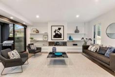 1/7 Farleigh Avenue Burwood VIC 3125 Perfecting the recipe for luxury low-maintenance living, this new four bedroom, three bathroom town residence has been designed to resonate with those who expect the best. A romantic setting, the sophisticated gas log fire, and plantation shutters create a gorgeous ambience through the lounge and dining with BBQ alfresco. The kitchen's success is underpinned by premium Miele appliances and swathes of stone. Boasting a ground floor guest suite, upper master suite, dedicated study zone, and a soaker tub in the central bathroom, stroll to PLC, Mount Scopus, Kingswood College, Deakin University, and the tram. Just completed, high-quality four bedroom, three bathroom home Designer lounge and dining with seductive gas log fire and shutters Superb Miele kitchen dressed in stone Tri-slide doors to an under-cover north alfresco with plumbed BBQ Upper study area with built-in desk Ground floor guest bedroom with floor-to-ceiling porcelain tiled ensuite Upstairs master bedroom with WIR and ensuite Main dual-vanity bathroom with a free-standing soaker tub Split system air-conditioning throughout Double auto garage Zoned for prestigious Roberts McCubbin Primary School Walk to PLC, Mount Scopus, Kingswood College, Deakin Uni and the tram Shop at Brickworks, Burwood One and Box Hill Central