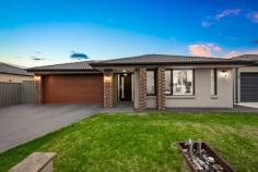 31 Chorus Way Cranbourne East VIC 3977 $770,000 - $830,000 Situated in the award-winning Hunt Club Estate on approx. 512m2, is this quality designer property built to the highest of standards by Dennis Family Homes. Showcasing a practical zoned layout, undercover & multiple quality inclusions – your family will be spoilt for years to come in a lifestyle of comfort! Highlights: - Generous light-filled Master suite complete with a huge walk-in robe for storage plus a luxurious ensuite boasting twin vanities, and oversized semi-frameless shower with niche & to top it off a separate WC - Three further sizeable bedrooms in a separate wing of the home all serviced with built-in robes & ideally situated around the family bathroom and separate WC - Study/ home office for those that need to work from home - TWO sleek living zones offer plenty of flexible space for the family to spread out – including a spacious open plan living lounge & meals at the heart of the home plus a set-up theatre room complete with projector, screen & surround sound for those movie nights in! - The chef of the family will love the modern kitchen well-equipped with a long list of inclusions such as 20mm stone waterfall benchtops, 900mm freestanding oven & rangehood, multiple pot draws, built in microwave, walk in pantry, dishwasher & more! - Step outside sliding doors and you'll find the under roofline decked alfresco for entertaining in all seasons, overlooking the manicured backyard that's perfect for kids & pets to play! Low maintenance established gardens ensure you will spend more time enjoy the finer things in life. - Double lock up garage for parking - Extra inclusions: Ducted central heating, evaporative cooling, smart home system for connection, 5.8kw solar panel system to help you save on your electricity bills, multiple downlights & feature pendants to kitchen, twin vanities to family bathroom & excellent storage, alarm system & intercom for security, full sized laundry with linen cupboard, garden shed for storage, Colourbond fencing & much more! Ideally positioned in a prized quiet street amongst other quality homes, 31 Chorus Way also boasts a fantastic family friendly location being within arm's reach of multiple leisure, schooling & shopping facilities. Adjacent to the street you will find the local Archersfield Drive reserve & playground for entertaining the little ones plus you'll find the 88-hectare premier outdoor sports facility - Casey Fields just a stone throw away. For schooling you have multiple quality schools nearby with Cranbourne East Primary & Secondary within the estate. Transport is a breeze with the 796, 897 & 981- bus services a few blocks away & easy access to the M1 Freeway via Berwick & Sth Gippsland Highway.