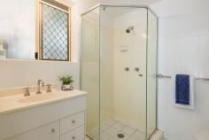 1 / 63 Jackson Street Hamilton QLD 4007 $490,000 to $500,000 Come home to this delightful, two-bedroom apartment in prestigious Hamilton. Set on the ground-floor of a small, established corner block, Apartment No. 1 features a spacious leafy garden, fully enclosed, for your exclusive use. Have your morning coffee on the adjoining patio and enjoy this light-filled space, with its own private entrance from the street. The living and dining area, with its lovely wooden flooring, flows to the sunny garden. The modern kitchen features stone benchtops and plenty of storage space. There are two bright bedrooms, fully-carpeted, with built-in robes in both. The main bedroom, which overlooks the courtyard, has an ensuite bathroom, and air-conditioning. The spacious main bathroom features an adjoining internal laundry room. Parking is a breeze. Drive in to the remote-controlled private garage, with easily enough room for bikes and extra storage. The main entrance is fully secure, with intercom access. The location is quite simply excellent. If you love having all amenities close by but crave a peaceful space to come home to--Jackson Street is a no-through road--this is the apartment for you. Doomben railway station is just a few minutes' walk away. Excellent bus links on Nudgee Road are at the end of the street. It's a short stroll to local cafes and shops, and just a minutes' drive to the new Woolworths development at Racecourse Village. Walk to the fantastic array of restaurants at Racecourse Road in just fifteen minutes, or to the lovely Portside cinema and restaurant complex on the river. Hamilton has long been one of Brisbane's best suburbs for good reason. It's a pleasant leafy location, moments from fantastic facilities and just 7kms from the CBD.