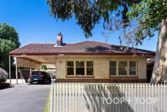16 Roslind St Kensington Gardens SA 5068 Driving through the streets you will realise how close you are to all the Eastern suburb amenities. A stone’s throw from cafes, restaurants, local shopping centres, and both public and private school schools, this low maintenance property is the ideal location to start your real estate journey. Alternatively, investors will love the position and ideal 510sqm land size to either renovate or build their dream home (stcc). This solid brick home features high ceilings, wide hallways, decorative cornicing, and Northern Box timber flooring. The home has a lovely flow and entertaining is made easy with a large kitchen, walk in pantry, dishwasher, breakfast bar and adjacent dining area. Picture windows in the front lounge room take in the northerly garden aspect and lush tree lined Roslind Street. After consultation with council, the spotted gum (Corymbia Maculata) in the front yard can be removed (stcc). An arborists inspection has been performed and a quote can be provided. Offering a flexible floorplan, complete with 3 bedrooms (all with built in robes) plus study/home office and an additional teenager’s retreat, games room or artist’s studio. A large bathroom with separate toilet and laundry space complete the interior floor plan. Keep cool in summer with the ducted cooling system and cosy up in winter with gas heating. Gather friends and family, as you will love entertaining in the outdoor paved alfresco area complete with built in bbq. Park the cars in the double carport and pop down the road to Long Lost Friend for breakfast or take a walk with the family at the nearby Kensington Gardens Reserve, the kids will love the Burnside Adventure Park and newly updated tennis court facilities. Take a short 3-minute drive to The Parade or Magill Road and be spoilt for choice with an array of shopping and entertainment options. Location is everything. Features Northern Box timber flooring Picturesque windows Ducted cooling Gas heating 4 bedrooms Separate studio 510 sqm land Local schools Zoned Magill Primary Close to Pembroke, St Peter’s Girls, St Ignatius Close to Marryatville Primary School, Burnside Primary School, St Joseph’s School Tranmere Zoned Norwood International High School Close to Uni SA Magill campus