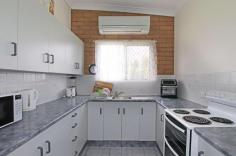 5 Prospect Street Biloela QLD 4715 $365,000 With the security of long-term tenancies in place, this property presents the ideal investment opportunity. This lowset brick duplex is conveniently located within walking distance to local amenities, including supermarkets, retail stores and schools. Each unit features an air-conditioned open plan living, dining and kitchen. Two bedrooms with built-in wardrobes and ceiling fans. The master bedroom is air-conditioned. Practical bathroom with a separate toilet and laundry. Security screens throughout. Located on an 809 sqm allotment, both units include a 3x3m* lawn locker and single vehicle carport. Collectively returning $460 per week, with excellent tenants in place. Contact Ray White Biloela before you miss out. Private inspections by appointment only..