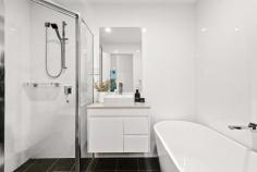 101/6 Beatson Street Wollongong NSW 2500 Impressively sized and crisply appointed, this quality courtyard apartment offers an idyllic urban retreat in one of Wollongong's premier pockets. Designed for elegant impact, interiors feature generous banks of floor-to-ceiling glass, a sleek snowy-white kitchen with stone benchtops, and chic alfresco flow from both the lounge and dining areas. The main bedroom boasts its own courtyard and a spacious ensuite; sleek new floating floors carry the home's stylish theme throughout. Just a stroll away from cafes and City Beach, this is an outstanding opportunity for comfort and convenience. Features: Beautifully bright + private with distant escarpment views Full width all-seasons courtyard, leafy attached garden Gas-equipped kitchen with dishwasher and breakfast bar Main bath with freestanding tub; separate internal laundry Built-in robes throughout, intercom, secure parking space Easy walk to golf course, MacCabe Park, transport + CBD.