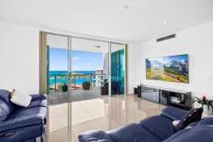 55/59-67 Corrimal Street Wollongong NSW 2500 A penthouse entertainer to rival any in Wollongong for sheer size and impact, this luxury home pairs an ultra-prestigious harbourside address with a premium grade of modern comfort. Spanning a magnificent single level, its footprint embraces a vast north-facing lounge, dining and kitchen zone complete with floor-to-ceiling glass, stunning sunrise-to-sunset views and four sleek flow points to the grand 80sqm private terrace. Ducted air, three-car garaging and resort-style residents' amenities provide an indulgent holiday lifestyle, steps from cafes and the coast path. Features: Epic ocean + harbour outlooks complemented by total privacy Alfresco access from expansive living area and all bedrooms Solid timber kitchen with stone benchtops + dishwasher Master ensuite with tub, robes throughout, internal laundry Pet-friendly complex with intercom, onsite pool and gym Stroll to both beaches, ocean pool, free bus and city centre.