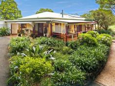 163 NORTH MALENY ROAD NORTH MALENY QLD 4552 A grand entrance awaits you at this very attractive home situated in highly sought-after North Maleny. The home itself is perfectly positioned on a 1 Acre block with park-like grounds that are a haven to wildlife, a gorgeous mature fig tree, citrus trees, and established gardens. With 3 bedrooms and 2 bathrooms, including a master with en suite and parent's retreat, the 9ft ceilings in this low set, Western Red Cedar home allows for loads of light and space. Outside, set the family and your four-legged friends free with grass to run on, trees to explore and a lifetime of adventures to create. There are also 2 dedicated entertaining areas that offer gorgeous rural views and the perfect outlook over the property itself. • Slightly sloping one acre with a northerly aspect • Whisper quiet location • Three bedrooms with built-ins • Master with en suite and parent's retreat • Wood burning fireplace • 9ft ceilings • Western red cedar boards • Ducted vacuum • Separate laundry and huge pantry • Established plantings with a cottage feel, citrus, soaring fig tree, mulberry tree, pecan and macadamia • Abundant birdlife; Cockatoo's, Rosella's, Lorikeet's, Galah's and White-Headed Pigeons. • Extremely private and serene with only one visible neighbour • Separate studio/workshop space for an artist, wood working or home office (power and water available) • 3 rainwater tanks (approx. 67,000L in total capacity) • Solar power and solar hot water • Shade shed for the caravan, trailer or boat parking • Just 2 minutes drive from Maleny shops, schools and cafes.