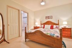 1 Wanera Way Mildura VIC 3500 $450,000 - $495,000 Team Hermans at Ray White Mildura is proud to present this unassuming property, in a popular westside location and a street in particular that is rarely seen to the market! This one is full of hidden surprises and just gets better the more that you look! A modest facade, yet attractive and immaculately kept, this three bedroom home holds a formal entryway, formal lounge room, formal dining space and an additional family/sitting room plus a light filled second meals space with bay window off a central kitchen. The classic, timber kitchen is well serviced with gas cooktop, electric oven and dishwasher to service the whole family. The master bedroom provides a walk-in robe and en suite bathroom, whilst bedrooms two & three (with built-in robes) are positioned at the opposite end of the house, for ultimate privacy. Outside continues to separate this home from the rest with a double carport, semi-enclosed with an automatic tilt-door on each end; access is provided through here in addition to the traditional side access for the caravan as well - drive straight down to your large shed with concrete floor, lights & power. You'll spot an array of outdoor entertaining space with convenient pull down blinds but additionally you'll be surprised with the extension on the shed - another outdoor entertaining area with a resort style vibe. Overhanging grape vines, an evaporative air con, wood fire heater and additional toilet & sink nearby. All these spaces make you feel like you're nowhere near town, yet you're only minutes to the Murray River & CBD.