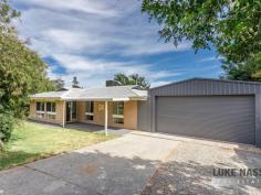 14 Bamlett Street Mount Nasura WA 6112 $400's Set in the sought after foothills of the Brookton Valley, you will find this beautifully renovated 3 bedroom, 1 bathroom home surrounded by lush private gardens. Fully fenced including and electric remote controlled gate. Nestled on a 779 Sqm block, this home would make a fabulous starter home, investment or downsizer. It’s location gives you that sought after hills living but just a short drive to local schools, shops, public transport and is close to Armadale, Kelmscott and Roleystone. When you step inside the home you are greeted with a light and bright, well cared for space. Stunning top quality flooring, fresh clean paint and fittings. The modern country-style kitchen opens out to kitchen/dining area and has access to the patio – great for those who love to entertain. The kitchen has dishwasher and the added touch of some beautiful glass lead light cupboard doors. The enclosed patio adds more living and entertaining space to the home, offering protection to the weather and making it ideal for all seasons. The recently built double garage has remote roller door and high clearance of 2300mm allowing a higher that normal vehicle under. It also has a rear single roller door to allow fantastic access to the rear garden. Other features include alarm, secure roller shutters and or security screens, solar hws and beautiful reticulated private gardens. 2 x R/C air conditioning and cool ducted evaporative air conditioning so you have the choice of either system. This is an “end date sale” which means all offers will presented on the 22nd December. This will give you time to view, research and look again if you like. My advice is, look early to avoid disappointment. *The sellers reserve the right to accept an offer prior.