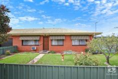 1/1 Celtic Court West Wodonga VIC 3690 $320,000 This well maintained two-bedroom unit is the perfect opportunity for owner occupiers and investors alike. This unit is a rare find as it has the versatility of an additional room for dining, study, or conversion into a bedroom or nursery. The kitchen and bathroom are original and in good condition, with plenty of cupboard space in the kitchen and an electric stove. The neat and tidy bathroom features a full bath and separate toilet, as well as plenty of storage and cupboard space throughout the home. Outside features include exterior shade blinds, a 1.5kw solar system to help keep the bills low, and an additional 1000L rainwater tank. Included in the backyard is a generous storage/workshop area making the most of the 385m2 block. With a covered alfresco area adjacent to the carport, a shade sale for parking outside the fence line, and an enclosed rear yard, this unit will suit outdoor entertainers or a four-legged family member. The gas hot water system and the gas wall heater have both been replaced recently. Located close to a major supermarket, service stations, town bus services, and with easy access to the freeway, TAFE and LaTrobe University. This is a strata titled property with no strata fees – the owners of both units simply share the insurance costs. This unit will not last long. Do not miss your opportunity. Call us now!