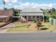 121 Murray Street Rutherglen VIC 3685 “Period” cottage style home in the heart of the popular and vibrant Rutherglen township adjacent to local park, swimming pool, Lake King and short walk to the town’s Main Street, Rutherglen Golf Course and Bowls Club. A truly convenient location. The residence boasts original details and characteristics throughout including ‘sky high’ ceilings and polished timber flooring. Comprising of three (3) generous bedrooms all with BIR's, ‘cosy’ lounge room, full bathroom, convenient laundry, and open modern kitchen/meals area. Outside the 700m2 (approx.) allotment offers a great timber deck overlooking a spacious lawn area, a front verandah with views over Lake King, 9.1m x 6m shed and a single carport. The size and position of the home on the allotment leave the opportunity to add further inclusions (e.g. pool, shed) extend the dwelling or build a unit/granny flat (S.T.C.A). Other features include: - Overhead fans - Split system heating and cooling - Gas appliances - Dishwasher.