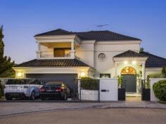28 Longstaff Gardens Dianella WA 6059 Where the drinks are always cold, the family can gather under the outdoor alfresco for a BBQ and everyone can spread out and enjoy their own space. Lavishly appointed to accommodate your growing families every need, your own sumptuous paradise awaits! Beyond the secure gated entry, WOW is what you will say as you step foot into the light filled entry foyer. Bound to make a statement with grand double height ceilings, you’ll immediately get an appreciation for the quality that lies beyond. To the right of the foyer your greeted by a large sunken lounge and adjoining dining room, the first of three entertaining spaces. Oozing with grandeur, its perfect for your next gala dinner or soiree event. Enjoying a lovely sense of connectivity with nature courtesy of floor to ceiling windows that flood the space with natural light, the HUGE open plan living, dining and kitchen area is the true ‘hub’ of the home. Love cooking? Then the gourmet chef’s kitchen with it’s abundance of storage, granite benchtops, top of the range appliances plus centralised island bench is perfect! With room to comfortably host a number of guests plus space for the whole family to spread out and relax, this is the spot where hours of laughter, creative discussions, and storytelling planning your next fortunes will be had! Heading via the sun-soaked atrium outdoors to the huge undercover alfresco with built-in BBQ, your family will love the secluded outdoor oasis that awaits! Mostly paved with a generous patch of Astroturf for the kids to play, and bordered by lush manicured planting, year-round entertaining never became easier. Back indoors and boasting a brilliant separation between living and sleeping quarters, the home has been thoughtfully planned to incorporate a ground-floor master suite. Enjoying a large WIR plus direct access to the main family bathroom, it’s ideal for visiting guests or extended family members seeking their own independence. Equally generous in size, the remaining two ground floor bedrooms all come with built-in robes, whilst the crisp and modern family bathroom features an indulgent spa bath, separate shower, double sink vanity plus adjoining W/C. Off the entry foyer, you also have a handy home office, perfect for those who work from home. Up the sweeping staircase to the penthouse style master suite, and you’ll feel like you’re on holiday all day, ever day! Opulently appointed with a huge walk-in robe, lavish ensuite with spa bath and double sink vanity plus its own private balcony, you can escape and indulge in 5-star luxury. And just when you thought it couldn’t get any better, you also have an adjoining sitting room with bar and private outdoor terrace. Overlooking the picturesque leafy treetops, it’s the perfect spot for kicking back and relaxing with a glass of your favourite drop in hand. Location wise, well this one doesn't get much better! Set high on the hill in a quiet family friendly cul-de-sac, amongst multi-million dollar mansions including two of the most expensive homes ever sold in Dianella. With the sought after Dianella Heights Primary School at the end of your street, the ever popular Pimlott & Strand Café within walking distance, plus shops, bus routes and major arterial routes all close by and the CBD under 10kms, its easy to see why the locals never want to leave! Delivering a lifestyle without compromise, this stylish hilltop entertainer is sure to be popular, so make your offer today or take a chance at Auction, onsite Sunday 20th February 2022 at 3:30pm (unless sold prior).