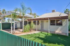 18 Carrington Street South Kalgoorlie WA 6430 $359,000 Set in the perfect location, opposite Kids on Carrington Day Care Centre, walking distance to primary and secondary schools and a stones throw from the Kalgoorlie CBD, is this lovely family home new to the market. Consisting of 4 bedrooms, the master with ensuite bathroom and walk in robe, 2 bathrooms and a beautiful mix of character with modern touches. The modern kitchen is spacious with stainless steel appliances and great storage. This is a very secure, low maintenance property with ample storage, spacious living areas, and a relaxed patio and garden area perfect for entertaining. 6x3m2 storage shed, double gates with side access to the yard for trailer storage. This property is immaculately presented, and wont last long, book your private viewing, call Martina 0417 180 103. 4 bedrooms – master with walk-in and ensuite Separate study or 5th Bedroom 2 Modern bathrooms Open plan kitchen and dining Formal living area Modern, spacious kitchen with stainless steel appliances, double pantry with lots of storage Spacious laundry Patio area perfect outdoor entertaining Extra tall double carport with 3.5m clearance, perfect for caravans, trailers and boats. Wood fire Gas heating, cooking and hot water Established gardens Security System 6x3m of outdoor storage Quality storage throughout Polished floorboards in entry, formal dining and formal living Side access with double gates Walking distance to schools, colleges and the CBD: Opposite Kids On Carrington Child Care Centre $2,226.19 p/a council rates.