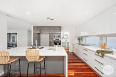 116 Government Road Shoal Bay NSW 2315 When it comes to space, entertaining, and modern finishes this lavish home ticks all the boxes. Totalling 4 generously sized bedrooms all with walk-in robes, 4 bathrooms, 3 living areas and multiple spaces to park the car, there is no shortage of accommodation for family and friends. Positioned only 1.2km to Shoal Bay and 1.4km to Fingal Bay, a home of this caliber and size is a rare find in the much sought-after Shoal Bay. Entry level boasts a fantastic media room and bedroom with ensuite. There is a main bathroom and large laundry, a well-appointed kitchen with a butler's pantry and luxurious 40ml stone benchtop. From there you will make your way to the stunning open plan living and dining area that flows seamlessly to your outdoor oasis. The backyard is made up of an undercover, patio, self-cleaning saltwater pool, paved fire pit zone and a substantial, detached shed/workshop. Upstairs you will find the master bedroom with a beautiful ensuite and double shower, walk in robe and private balcony. On this level there is also another two bedrooms with walk-in robes, a third living area and a fourth bathroom. Whilst the home itself is amazing, the adjoining bushland allows you to walk to multiple beaches, cafes and the Shoal Bay Country Club year-round. Uncompromising on size, style and practicality this magnificent home has everything you could possibly want or need and is bound to attract a multitude of buyers. Don't hesitate, as this property is a rare find and won't last long. Key Features: - 4 Bedrooms, 2 with ensuites - 3 living areas - Office/study - Self-cleaning Saltwater pool - Undercover balcony - Butler's Pantry and 40ml stone bench tops - Drive thru access to the back - Detached shed/flat with ample storage - Ceiling fans & ducted air conditioning - 1.4km to Fingal Beach - 1.2km to Shoal Bay Beach and the Country Club.