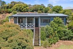 28-30 Halls Road Myrtleford VIC 3737 Perfectly positioned within the hills of Halls Road, this listing offers two lots under one title and has the rare opportunity for development with separate access already conveniently created with the option of multiple sub-division options (STCA). The stunning views are exclusive to this position only as it is the highest elevation of the first incline of Halls Road this also provides preeminent privacy, Furthermore to the development, this listing also has an additional main feature of an existing clad dwelling designed to make the most of the block with 3 bedrooms, study/sleepout + 1 bathroom it is a must to see. With a recently renovated kitchen with electric wall oven, electric cooktop and open plan dining/living area looking out to the spacious balcony with amazing views. This property is perfect to live in and/or develop. Vacant block - 1291 sqm + block with dwelling 1670 sqm. Inspection is a must. Can you see the vision? Contact Agent today. Offers to be put in by COB 18th March 2022.