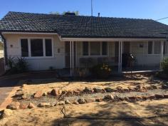 15 Scott St Wyalkatchem WA 6485 $95,000 Situated on the corner of Scott and Swan St. The land is a generous 992m2, the home is jarrah framed fibro clad with a tile roof, 3 generous size bedrooms, lounge with French doors that opens out to the front veranda, a good sized kitchen – dining with electric stove, neat bathroom, laundry, with electric HWS and WC under main roof, ducted evaporative air conditioning throughout, a gas bayonet is used for winter heating. The property has a large patio to the rear of the house, a single car garage, the property is well fenced with super six and Colourbond Neeta screen, rear access is available. The property is currently tenanted. Wyalkatchem is a safe community with a Hospital, Dr, Chemist, School to year 10 and most other services are available. For an inspection please call Eric on 0429886107 to make an appointment to view this property.