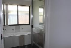 11 Scarborough Cct Blacks Beach QLD 4740 $415,000 This is a beautiful, air conditioned spacious 4 bedroom home well designed & well presented to suit your needs. The kitchen/dining area is open plan design with a very large family/living area opening to the large outdoor entertaining area. The master bedroom has an ensuite & walk in robe, the other bedrooms all have built ins. The main bathroom has both a shower & bath & there is a separate toilet plus ample storage space in the hallway including a linen cupboard. Separate laundry. Very good value for a place of this calibre, come & inspect now, Call Jenny 0408 11 33 55 ââ¬Â¢ 4 bedrooms ââ¬Â¢ Master with ensuite & walk in robe ââ¬Â¢ Large living/family room area ââ¬Â¢ Open plan kitchen/dining ââ¬Â¢ A/C ââ¬Â¢ Large outdoor entertaining ââ¬Â¢ Double remote garage.