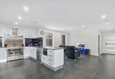 42 Rosina Street Kembla Grange NSW 2526 $980,000 - $1,050,000 Set on an elevated corner position overlooking peaceful beautiful farmlands. This modern family home offers impressive proportions and contemporary finishes throughout and bathed in natural sunlight due to the north/west aspect. A perfect family sanctuary for year round living and entertaining while being situated close to all the local amenities makes this the ideal family home or investment property Generous bedrooms with built-in wardrobes Master bedroom with walk-in wardrobe and modern ensuite Offering a selection of expansive living and entertaining spaces Quality gourmet kitchen with stone benches and breakfast bar Expansive outdoor terrace with lounge and dining areas Plenty of yard for the kids and pets, low maintenance gardens Home theatre room, ducted air-conditioning throughout Remote double car garage, ample storage, off street parking.