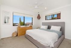 11 Uniacke Drive Banora Point NSW 2486 Set in a quiet cul-de-sac with ocean and coastal views, nestled amidst other excellent homes this property represents excellent value for any growing family or investor. This modern family home is a must to inspect, property features include: * Open plan lounge and dining, opening onto east facing ocean view balcony * Separate enclosed sunroom, perfect for all weather dining * Updated designer kitchen with stone benches, breakfast bar, feature pendant lighting and stainless steel appliances * Front entertaining balcony with ocean and coastal views * Three Bedrooms upstairs with ceiling fans - master bedroom with ensuite * Landscaped gardens featuring cycads, bottle trees and cactus for the green thumbs * Additional off street parking for another 4 or more vehicles * Quiet cul-de-sac location, ample room for a pool * East facing ocean and coastal views, never to be built out * Rental Appraisal $650-$700pw * Double lock up garage with internal access * Less than a few hundred metres to the Tweed River * Under 10 minutes to Gold Coast - Tweed Coast beaches and Gold Coast Airport * Local schools and shops nearby.
