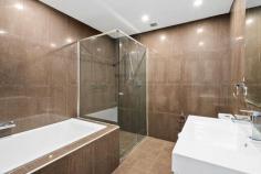 18/3-15 Belmore Street Wollongong NSW 2500 $775,000 - $815,000 More like a townhouse than an apartment, this quality residence offers a modern lifestyle to inspire. Beautifully equipped with a generous interior layout and sunny entertainers' courtyard, it provides a haven of carefree comfort enhanced by sleek floating floors, reverse-cycle air conditioning, and a huge double garage with connecting door. Two bedrooms reside upstairs and are accompanied by a family- friendly bathroom and separate laundry. Peaceful and position-perfect, this superb home enjoys momentary access to cafes and restaurants, mall shopping, nightlife and all CBD conveniences. Features: Fantastic opportunity boasting direct entrance from street Combined lounge/dining flows to easy-care enclosed courtyard House-sized kitchen features gas cooking + stone benchtops Carpeted bedrooms with built-in wardrobes and shared balcony Full bath plus guest W/C, storage area in DLUG, complex pool Short walk to pubs, bars + clubs, less than 1km to station.