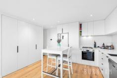 2206/8 Hallenstein St Footscray VIC 3011 $575,000 - $625,000 Enjoy awe-inspiring, unobstructed, sweeping views of the Maribyrnong River and Flemington Racecourse in this new, luxe and spacious two-bedroom apartment. Perfect for first homebuyers and investors alike. Upon entry, timber floors guide you to the open plan living and dining area. This space features curved panoramic windows that allow light to fill the room and frame the views of the surrounding landscape. Indoor/outdoor entertaining is made easy as this area opens to the entertainer’s balcony where the outlook is truly breathtaking. The homes kitchen fuses style and functionality. It boasts extended stone bench tops, Bosch stainless steel appliances, integrated fridge, hexagon splashback tiles, black hardware and an abundance of storage. The master suite is large and light filled featuring curved, wall to wall windows. It is serviced by an ensuite with a large shower. The second bedroom follows similar trends with racecourse and river views. Both bedrooms feature luxe charcoal carpeting and substantial, mirrored built-in robes. The central bathroom features shaving cabinets, floor to ceiling tiles, hexagon feature tiles, black tapware and a large shower with rainfall shower head. The apartment is completed by a European laundry and separate linen cupboard. Enjoy all the amenities Vic Square has to offer, including, the sky garden on level 4, a fully equipped gym, pool, games room with billiards table and cinema. If that isn’t enough, located only 6kms from the city, take advantage of its close proximity to everything your heart desires. Footscray’s burgeoning bar and restaurant scene, Victoria University, Footscray Train Station, the Maribyrnong River, bus and tram tops and Footscray Park are a short walk away. Additional features: – Split system air conditioning and heating in the lounge – Window furnishings – Secure intercom entry – Designated spot in secure, underground car park.