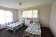 125 Wadleys Rd Reedy Marsh TAS 7304 $750,000 3 Bedroom brick home set on approximately 23 Acres Open Plan kitchen, dining, living. Colourbond garage plus Colourbond workshop. All cleared with good fencing and gates. Shelter belt plus numerous mature Blackwood trees. Steel stock yards and loading ramp. 4 dog kennels. 4 Pup kennels with yards. Numerous other equipment included in sale. Alternatively this is a perfect tree change/Lifestyle block. 5 minutes to Deloraine.