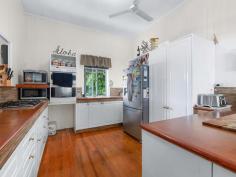 39 John Street Rosewood QLD 4340 $520,000 Presenting the big blue house on a generous 1,406m2 in the heart of Rosewood, only a stones throw to the local shops and parks. This classic Queenslander home features high ceilings, large doorways, generous rooms, window awnings, multiple living spaces and more. The best features include - • Master bedroom with walk-in robe • Two additional bedrooms • Kitchen has gas cooking, double door pantry, buffet window into the dining room and breakfast bar • Air-conditioned living room with fire place • Dining room • Covered outdoor entertaining - front deck and back • Main bathroom with double basins and plenty of storage with separate toilet room • The whole downstairs of the house has been converted into a sizeable rumpus room/teenage retreat/multi-purpose room with additional storage rooms • Laundry room with second toilet • Duel driveway with access to the single carport at the front or side access to the backyard • New roof installed 2021 • Level and fenced 1,406m2 block • Concrete under and around the house 100m* to the local supermarket and centre of Rosewood 20 mins* to Ipswich CBD 14 mins* to Yamanto Shopping Centre 7 min* walk to the Rosewood train station.
