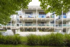 31/47 Wentworth Avenue Kingston ACT 2604 $460,000+ Treat yourself to easy-care living with this sublime inner south apartment. Step inside where a light-filled and open-plan layout awaits. A quality kitchen, with gas cooking and a drawer dishwasher, flows into the living room where air-conditioning promises year-round comfort. Sliding doors open out to the huge balcony with a beautiful leafy outlook ready for you to sit back with a coffee in one hand and a good book in the other. There’s plenty of space for a dining suite and a BBQ as well, perfect for dining alfresco throughout the summer. The bedroom is filled with natural light and enjoys easy access to the bathroom. There is also a study nook, with a built-in desk, for those who work from home. A brief on the Viridian complex, it was designed by Rodney Moss from Cox Humphries Moss firm, incorporating glass panels created by Australian/Japanese artist Keiko Amenomori-Schmeisser. The design incorporates landscaped courtyards with grassed areas, deciduous shade trees, mass plantings & two cooling fern gardens. The native plants complement exotics and birds that nest in the gardens, there is also a community herb garden run by the residents. This must-see apartment is located within walking distance of the Kingston Foreshore with a host of cafes and restaurants to discover. Mornings can be spent strolling around Lake Burley Griffin and you are also close to all the services you could need from major retail hubs to public transport and more. Or wrap up the day down Eastlake parade with a drink at any one of the popular bars or restaurants then simply make your way home in a couple of minutes to retire for the day. The Owners’ Favourite Part: Great location in Kingston! Features include: – Large sundrenched open plan lounge/dining area – Living area opens to a beautiful full-length balcony – Kitchen equipped with gas cooking & integrated dishwasher – Stone benchtops, ample storage, microwave space – Convenient Study area away from the living space – Well-appointed bathroom with European Laundry – Reverse-cycle air conditioning unit in the living area – Intercom, storage shed, 1 car space, remote basement – Open-air tranquil & mature internal common courtyards – Perched on level 3, secure, safe, single-level apartment living.