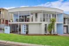 1/4A Cole Street Kiama NSW 2533 Perched high in a quiet street, capturing ocean glimpses and cool sea breezes; this stunning, eclectic style home is a must see! Built by quality builder Paul Kirk you will be amazed by the design which maximizes space and boasts luxury. You will love the versatility the clever floor plan offers, perfect for a small family, couple or even a single. Flooded with natural light and floor to ceiling louver windows, stacker doors and a favourable east, north/east aspect. Two living area which both flow through to the outdoor areas the font is tiled and perfect for summer, the back is a suntrap for cool winter days. Featuring a gourmet kitchen with stainless steel bench tops, Bosh and Klein Maid appliances and a fitted out pantry. The bathrooms showcase floor to ceiling tiles and a beautiful deep bathtub to soak away the stress of the day. This home is modern, easy care and ready to enjoy with no maintenance required.