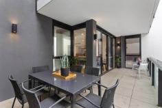  104/288 Canterbury Rd Surrey Hills VIC 3127 $790,000 - $830,000 A low-maintenance city lifestyle is assured in the stylish surrounds of this two-bedroom boutique apartment in leafy Surrey Hills. Ideally located in walking distance to Chatham Gardens, city train and Maling Road cafes and shops, this smart abode is sure to appeal to investors and downsizers. Spacious and drenched in natural light, it displays the highest quality finishes and fittings including engineered oak floorboards, wool carpets and glazed windows. The main living zone includes a roomy sitting and meals area and a gourmet kitchen with marble flourishes and a Miele oven and stove top, breakfast bar, stone benches, integrated dishwasher, and integrated Fisher and Paykel fridge. The space boasts full-length sliding doors opening to a generous balcony with room for alfresco dining overlooking a verdant communal courtyard. The bedrooms both feature built-in robes and the master has the added luxury of a fully-tiled ensuite with wall-mounted vanity, designer tapware and frameless shower screen. The second bedroom has easy access to the main bathroom which has the same impressive designer features. Additional highlights include European laundry, secure video entry, basement parking, storage cage, central and zoned heating and air conditioning. 