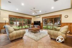 27-29 The Boulevard Narre Warren South VIC 3805 $1,100,000 - $1,200,000 Standing proudly on an expansive 1156 sqm allotment within the Cypress Hills Estate, this evocative Federation home delivers comfort in a glorious period setting. Boasting a versatile floorplan that is ready to adapt to your needs, this beautifully maintained home is a rare find and proudly owned by the same family for nearly 20 years. Welcomed by an oversized entry, expansive formal lounge with gas log fireplace, separate formal dining area as well as the generous family and meals space at the rear, saturated in natural light. Incorporated into the family/meals area is the huge Blackwood kitchen which enjoys granite benchtops, quality appliances and an abundance of storage Offering 3 oversized bedrooms, master with walk-in robe and ensuite, central bathroom with separate toilet, and a home office that could be easily converted to a 4th bedroom should your needs require. With 9ft ceilings, ornate cornices, ducted heating/cooling, twin split system air conditioning, ducted vacuum and solar array to name a few of the many features. Outside is an entertainer’s paradise with enclosable alfresco, inground pool and integrated spa, poolside bar and toilet surrounded by expansive established gardens and manicured lawn. Completing the home, you will find vehicle accommodation for the whole family with a cavernous triple garage with a separate workshop and gated side access, perfect for a prized boat or caravan. Numerous visitor vehicles can be accommodated onsite via its two gated driveways. With every attention to detail and impeccably maintained, the home is sure to impress the fussiest of buyers.