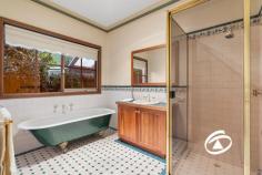 27-29 The Boulevard Narre Warren South VIC 3805 $1,100,000 - $1,200,000 Standing proudly on an expansive 1156 sqm allotment within the Cypress Hills Estate, this evocative Federation home delivers comfort in a glorious period setting. Boasting a versatile floorplan that is ready to adapt to your needs, this beautifully maintained home is a rare find and proudly owned by the same family for nearly 20 years. Welcomed by an oversized entry, expansive formal lounge with gas log fireplace, separate formal dining area as well as the generous family and meals space at the rear, saturated in natural light. Incorporated into the family/meals area is the huge Blackwood kitchen which enjoys granite benchtops, quality appliances and an abundance of storage Offering 3 oversized bedrooms, master with walk-in robe and ensuite, central bathroom with separate toilet, and a home office that could be easily converted to a 4th bedroom should your needs require. With 9ft ceilings, ornate cornices, ducted heating/cooling, twin split system air conditioning, ducted vacuum and solar array to name a few of the many features. Outside is an entertainer’s paradise with enclosable alfresco, inground pool and integrated spa, poolside bar and toilet surrounded by expansive established gardens and manicured lawn. Completing the home, you will find vehicle accommodation for the whole family with a cavernous triple garage with a separate workshop and gated side access, perfect for a prized boat or caravan. Numerous visitor vehicles can be accommodated onsite via its two gated driveways. With every attention to detail and impeccably maintained, the home is sure to impress the fussiest of buyers.