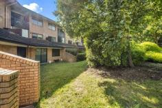17/17 Medley Street Chifley ACT 2606 Situated on the middle level in the popular Hermitage complex in Chifley is this lovely two bedroom apartment. You will absolutely adore the location, with Phillip's huge array of amenities - including Woden Westfield - all within walking distance. Major arterial roads such as Melrose Drive, Yamba Drive and Tuggeranong Parkway are all literally around the corner. The interior is very neat and tidy, with an impressive 70sqm of living space featuring timber-style flooring and direct access to a generous private balcony. Large windows provide lots of natural light, while the kitchen has been recently updated with a subway tile splashback, new cupboards and a dishwasher. Both bedrooms are well-sized with peaceful leafy views and lots of light. The apartment also has its own laundry, split system air conditioning, and dedicated carport. This is a fantastic opportunity for a first home buyer or investor seeking a low maintenance, turnkey property that sells itself. Middle-level apartment Fabulous location Very neat and tidy Low maintenance, great investment Contemporary timber-style flooring 70sqm living space New kitchen with dishwasher Renovated bathroom Two bedrooms Large private balcony Dedicated carport Internal laundry Storage unit Walk to Phillip and Woden Easy access to major arterial roads.