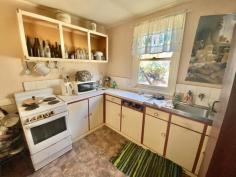 24 Halliday St Manmanning WA 6045 $99,000 This property is located in the beautiful country side of Manmanning, and just 201kms from Perth & would make the perfect weekend getaway. The home itself comprises of 3 bedrooms, 1 bathroom, lounge room with a fire place, a second living area, dining room, kitchen and laundry with high ceilings throughout plus a store room off the veranda. Sitting on 2001m2, there is plenty of room for the kids or dog to explore & roll around on the lawned backyard. There's also a raised veggie garden, chicken coop, established gardens and 2 garden/storage sheds. The home will need some work, this includes the ceilings, bathroom - still functional, a new stove and the wooden veranda will need some attention. This property has a lot of potential and perfect for the creative handyman or woman who is happy to tinker then enjoy the fruits of their labour. With the considerations of some TLC this property is priced at just $99,000. Rates are $500 approx (this contains land rates and Emergency services levy). For more information please contact Jessica 0456 147 647 or Chloe on 0419 920 418.