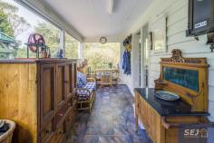  335 Hazel Park Rd Welshpool VIC 3966 $785,000-850,000 Complete privacy surrounded by approx. 4.8 acres of land with a long tree lined driveway leading you home. Charming residence amidst picturesque rambling cottage gardens, orchard, vegetable patch, 4 fenced paddocks and excellent shedding. With wide verandahs on two sides there is always somewhere to sit and catch the sun, listen to the birds, enjoy the peace and quiet. Pretty entrance foyer leads into the spacious open plan interior with easy care polished flooring. The ambience of a wood heater is combined with the convenience of RC/AC to ensure comfort in every season. Every window enjoys views of the stunning garden setting, bringing the outside in to connect you with nature. Modern kitchen with quality appliances, huge walk in pantry and island bench / servery to dining area. Light filled sunroom / studio space or study. Three double sized bedrooms, family bathroom, laundry / utility room and separate w.c. Minimal running costs with solar and mains power and solar hot water. Shedding includes a 3 bay lockable shed with concrete floor, lights and power plus a 3 bay extra height, chook pen, disused dairy and hay shed. Excellent water storage. Quiet rural location just 8 minutes from Agnes Falls with Toora (7 minutes) and Welshpool (8 minutes) a short sealed drive away. 