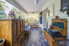 335 Hazel Park Rd Welshpool VIC 3966 $785,000-850,000 Complete privacy surrounded by approx. 4.8 acres of land with a long tree lined driveway leading you home. Charming residence amidst picturesque rambling cottage gardens, orchard, vegetable patch, 4 fenced paddocks and excellent shedding. With wide verandahs on two sides there is always somewhere to sit and catch the sun, listen to the birds, enjoy the peace and quiet. Pretty entrance foyer leads into the spacious open plan interior with easy care polished flooring. The ambience of a wood heater is combined with the convenience of RC/AC to ensure comfort in every season. Every window enjoys views of the stunning garden setting, bringing the outside in to connect you with nature. Modern kitchen with quality appliances, huge walk in pantry and island bench / servery to dining area. Light filled sunroom / studio space or study. Three double sized bedrooms, family bathroom, laundry / utility room and separate w.c. Minimal running costs with solar and mains power and solar hot water. Shedding includes a 3 bay lockable shed with concrete floor, lights and power plus a 3 bay extra height, chook pen, disused dairy and hay shed. Excellent water storage. Quiet rural location just 8 minutes from Agnes Falls with Toora (7 minutes) and Welshpool (8 minutes) a short sealed drive away.