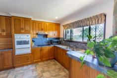 29 MIFSUD DRIVE SARINA BEACH QLD 4737 $720,000 When inspecting, please enter "Misfud" into Google - incorrectly spelt on all Google sites). A bitumen 20min drive from the City Gates presents this immaculately maintained property, tucked into the summit of a hill with panoramic views, constant ocean breezes, abundant soil, a well-designed family home & sheds to accommodate multiple vehicles or machinery! The four-bedroom home offers views from every window & boasts a neat ensuite off the master. All bedrooms are well-sized with three of the four having built-in wardrobes with fans, carpet & air conditioning. The fourth bedroom is currently used as an office & storage room but could easily be converted if wished. Upon entry, the lounge is defined with interior dark brick arches that have the effect of an open space, leading to the open plan dining room & flowing into the well-appointed large kitchen. Cook for days with endless views of the mountains whilst enjoying ample bench space & plentiful overhead & underbench cupboards. The breakfast bench is at the entry of the kitchen & is fantastic for casual cuppas or kids doing homework. Right beside the breakfast bench is internal entry into the house from the lockable garage, which is very appreciated when lugging groceries into the house. The undercover enclosed patio acts as a lovely entry area &, being surrounded with security screens, could be a beautiful greenhouse or entertaining area. Step out of the lounge or dining room to concrete covered patios where you could watch the world go by without a worry, enjoying endless views & constant cool breezes. Landscaped gardens & established abundant fruit trees/vegie patches/herb gardens are evidence of years of lovingly devoted toiling to produce the healthiest & naturalist that Mother Earth can provide! The shed will be the envy of every Man-Cave-loving-male with 10 bays (5 bays fitting 2 cars in tandem in each bay). 4 massive doors open outwards for easy access & the 5th bay has been converted into a shelved workshop/"office". With power, windows for breeze, shelving that stays, a hard-wired welder etc, move straight in & begin work immediately! Expenses are at an all-time low at this address with solar panels; 3 x 6000 gallon rainwater tanks; 2 x 6000 gallon bore water tanks; pottable bore water; septic sewer system & grey water used on the grounds for all year lushness. This property is just divine! It oozes of family memories, loving get-togethers & fantastic memories for any children lucky enough to be raised in the healthy outdoors with memories of exploring the grounds; riding the resident horse (included in the sale) & toasting marshmellows around the firepit. With a very short drive to both Sarina & Mackay, come home each day to totally switch off & relax, being so close to the beach. Be incredibly quick to inspect this tightly-held, highly sought-after beautiful family home & adopt the accompanying lifestyle of peace & tranquillity!