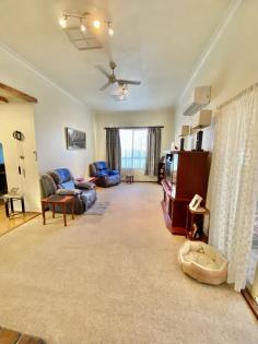 5 Railway St Koorda WA 6475 This beautifully presented 1930’s home is complete with 3-bedrooms 1-bathrooms, 2-bay lockable garage, weatherboard construction and iron roof, carpet & bamboo flooring with tile in the bathroom, laundry and toilet. The home boasts an enclosed carpeted entry room - a large lounge room with carpet, high ceilings throughout, a fire place and reverse cycle air conditioner - dining room with bamboo flooring and raked ceilings which flows into the kitchen allows access to the patio via glass sliding doors. The kitchen comprises of bamboo flooring, gas stove cook top and electric oven. The master bedroom features wardrobes, fan and a reverse cycle air conditioner. Bedroom 2 and 3 both have carpet, with bedroom 3 having access to the patio. The property features a generous sized undercover patio - fully enclosed, and allowing access to the external wet areas (laundry, toilet and bathroom). There's a large lawned backyard and a separate fenced off area at the rear of the property making a perfect place for your chooks to roam. You will also find 2x water tanks (5,000L & 15,000L), solar HWS, lovely established gardens, workshop, storage shed all enclosed around the perimeter with colourbond fencing. The property comes fully furnished including white goods - perfect for the investor!